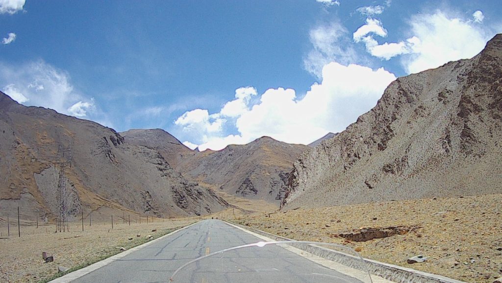 Surrounded by dark looking mountains.