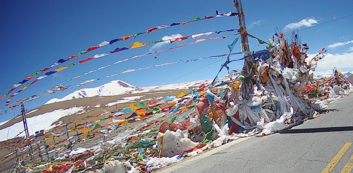 At the highest point of every pass there is colourful bunting.