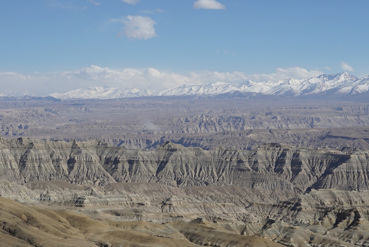Clay rock formations flanked by sno covered mountains - beautiful!
