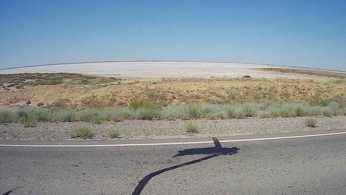 Areas beside the road looked like it was covered by snow... It's dried lakes covered in salt.