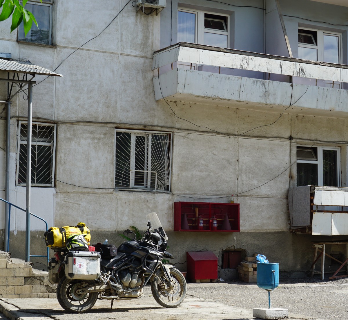 My steed and Soviet style hotel block.