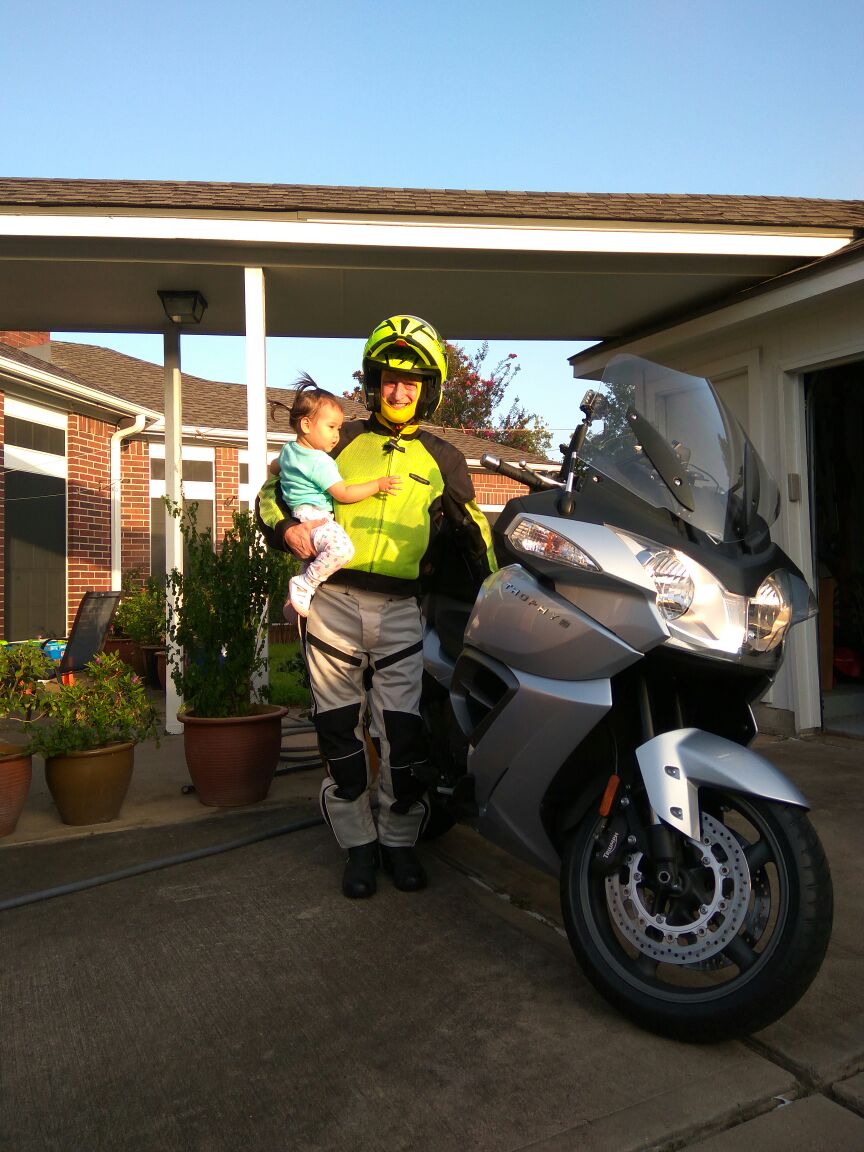 At home in 4210 Lakecrest Dr with little Eva 18 months old.