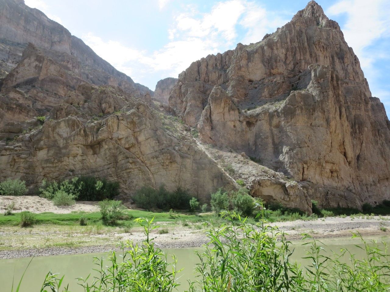 Rio Grande separating the US and Mexico. It's not very grand or not very wide. Very easy to cross either way and I saw Mexican salesmen selling Mexican wares.
